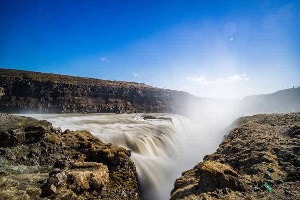 Beautiful landscape with a lower part of Gullfoss waterfall and a canyon of Hvita River in southwest Iceland. Gullfoss is one of the most popular tourist attractions in Iceland. The wide Hvítá flows down into a wide curved three-step \