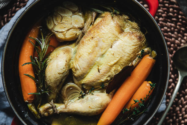 istock Clear Chicken broth with vegetables in a pot 1367170921