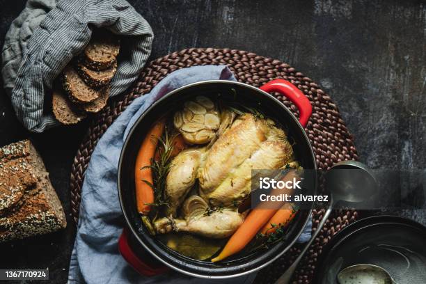 Healthy Chicken Soup With Organic Vegetables And Wholegrain Bread Stock Photo - Download Image Now