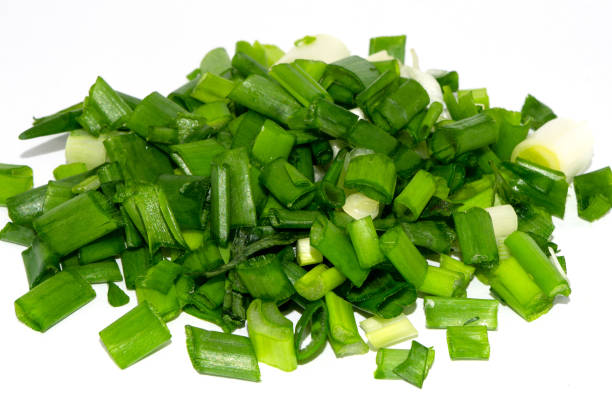 istock chopped green onions on white 1367171328