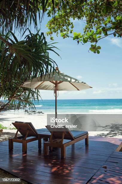 On The Beach Stock Photo - Download Image Now - Beach, Lounge Chair, Blue
