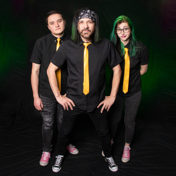 istock Rock Band Wearing Yellow Ties 1367173527