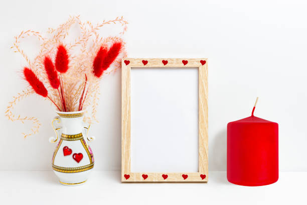 istock Mockup blank photo frames with Valentine's Day decor. 1367174767
