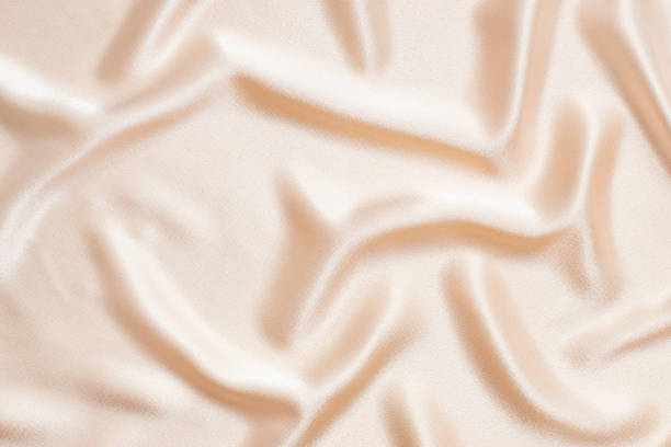 istock Abstract satin background cream color 1367175089