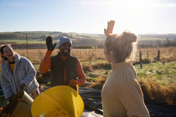Community Garden Volunteers Give a Hi -Five