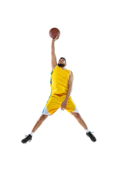 istock One professional basketball player practicing isolated on white studio background. Sport, motion, activity, movement concepts. 1367176383