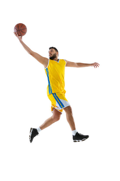 istock One professional basketball player practicing isolated on white studio background. Sport, motion, activity, movement concepts. 1367176390
