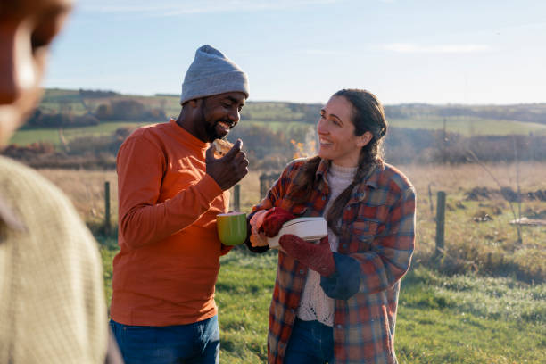 istock Couple Enjoying Packed Lunch Outdoors Together 1367176458