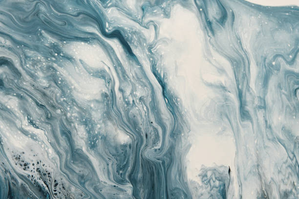 istock Fluid Art. Liquid white and grey abstract paint drips and wave. Marble effect background or texture 1367177556