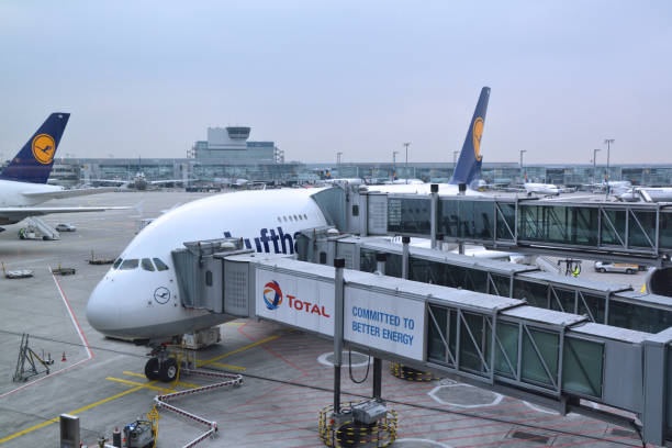 Lufthansa Airbus A380 plane is being prepared for boarding of passengers flying to Miami at the airport in Frankfurt. Frankfurt, Germany - March 17, 2017: Lufthansa Airbus A380 plane is being prepared for boarding of passengers flying to Miami at the airport in Frankfurt. Airbus A380 is the world's largest passenger airliner. frankfurt international airport stock pictures, royalty-free photos & images