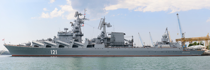 People visit the USS Wisconsin battleship, located at the Nauticus Museum in downtown Norfolk, Virginia, USA, on a sunny day.