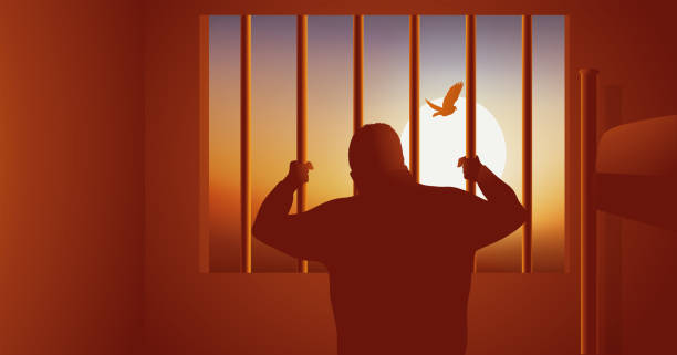 A man in prison stands at the bars. vector art illustration