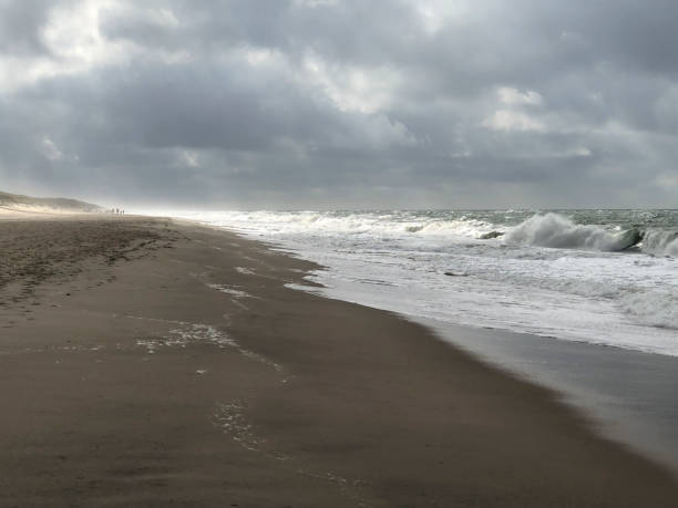 istock scenic autumn sandy beach with waves and dunes in Sylt 1367188614