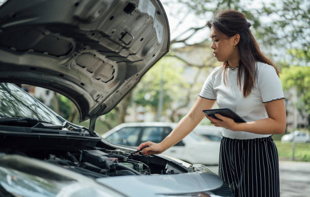 istock An Asian Insurance adjuster inspecting damage to vehicle 1367189607