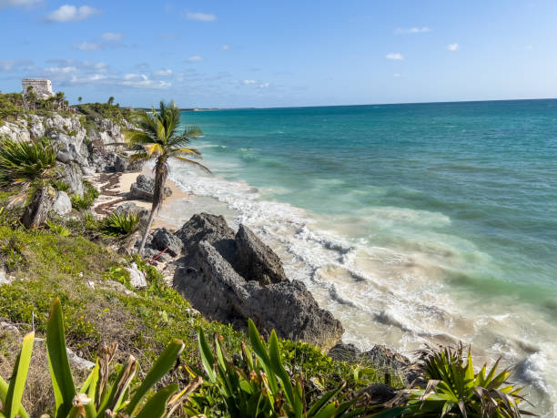 Amazing blue water and the beach, Tulum ancient Mayan temples. Quintana Roo, Mexico