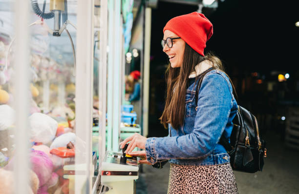 istock Toy machine and woman 1367193023