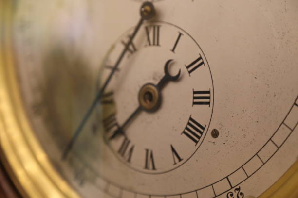 istock Close up of antique clock-face 1367194178