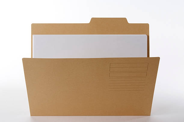 istock Isolated shot of standing brown file folder on white background 136719533