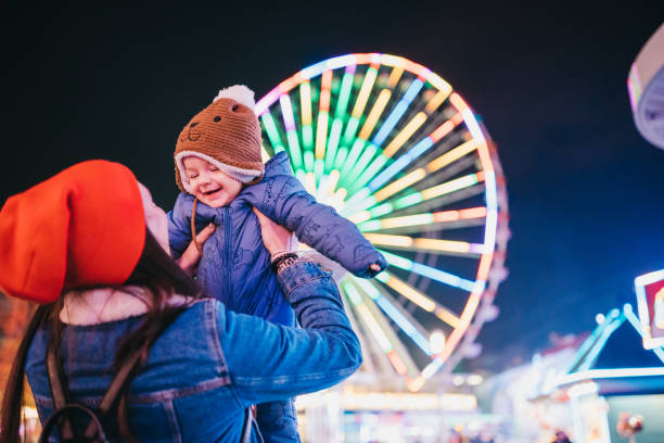 istock Mom and son at the amusement park 1367197357
