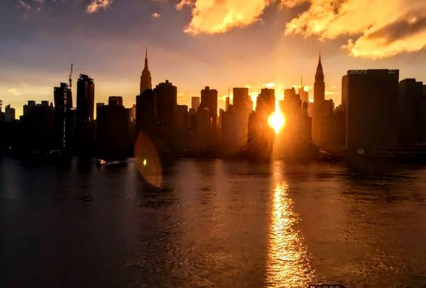 istock Sun beams through the big buildings 1367201168