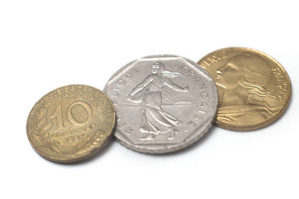 istock vintage french coins on white background 1367201690