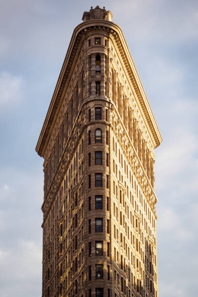 The famous Flatiron Building at the end of the day in New York stock photo