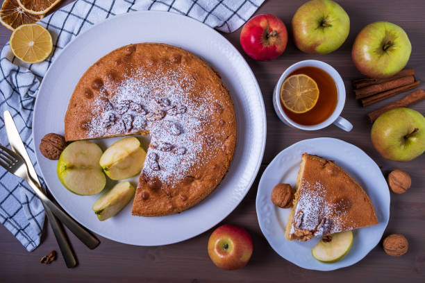 istock Sliced apple pie with walnuts and ripe apples 1367206823