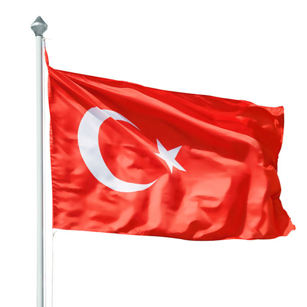 istock Turkish flag on flagpole isolated with clipping path 1367207276