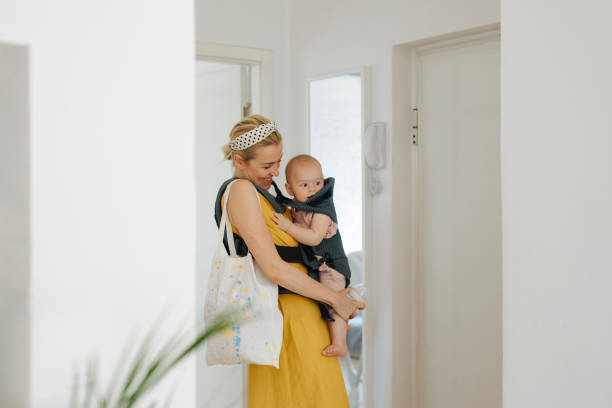 istock Happy Mother and Her Child Ready for a Walk Outside 1367213850
