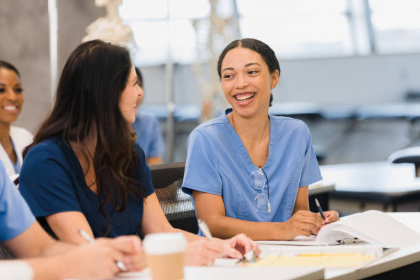 istock During break in class, female nursing students chat together 1367214063