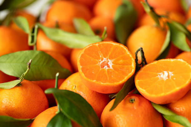 мандарины - orange fruit large group of objects food стоковые фото и изображения