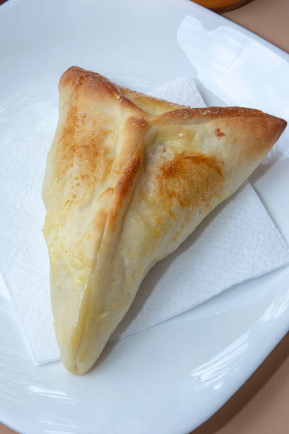 istock Sfiha, or esfirra in Portuguese, on white plate 1367216844