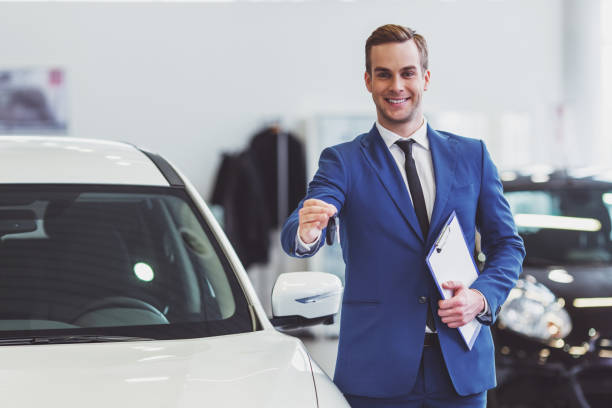 istock Businessman in motor show 1367219823