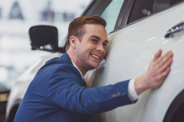 istock Young businessman in motor show 1367219902