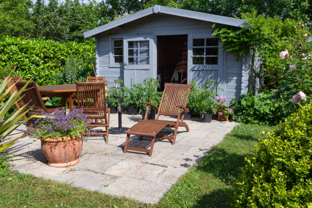 shed with terrace and garden furniture - shed imagens e fotografias de stock