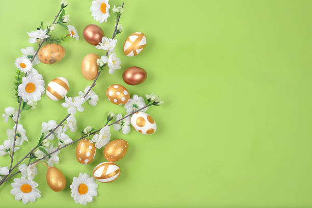 istock Happy Easter concept, spring card, background. Decorated golden Easter eggs on a gentle background. Minimal holiday concept, space for text, banner for screen 1367221153
