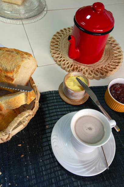istock Breakfast table with coffee with milk and varied food 1367221287
