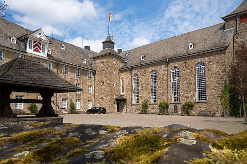 Hueckeswagen, Germany - May 1, 2021: Panoramic image of the old castle in the downtown of Hueckeswagen on May 1, 2021 in Germany