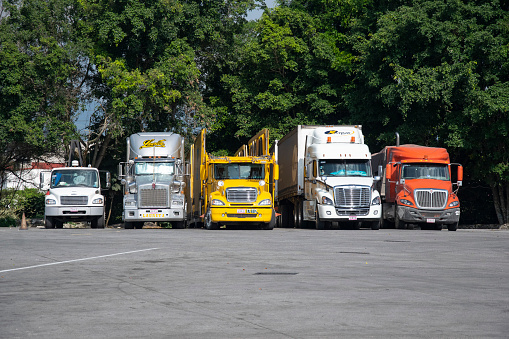 Puebla, Mexico - 1st January, 2019: Colorful American tractor trucks on a parking. Transportation is the blood stream for any developed economic system.