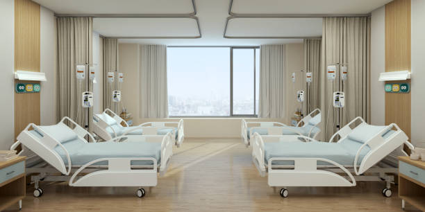istock Hospital recovery room with beds and chairs.3d rendering 1367229675