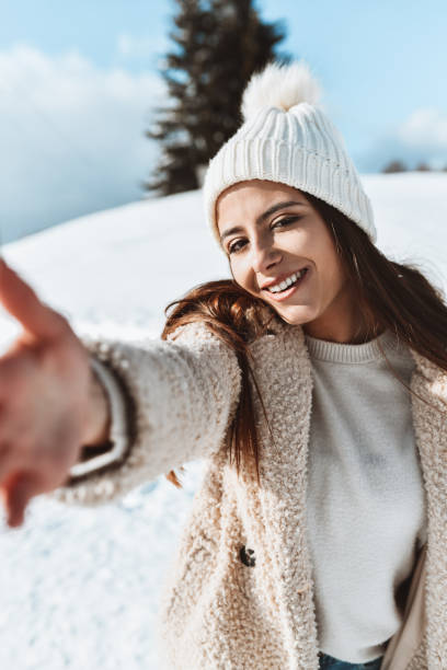 istock Selfie By Smiling Female Enjoying Time Spent In Snow 1367234556