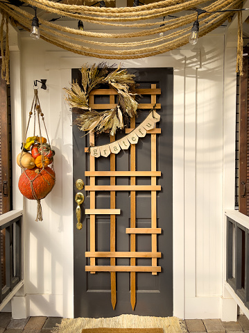 Front porch entrance decorated for fall holidays