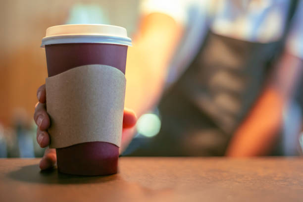 istock An unrecognizable barista gives a prepared coffee to a customer 1367236273