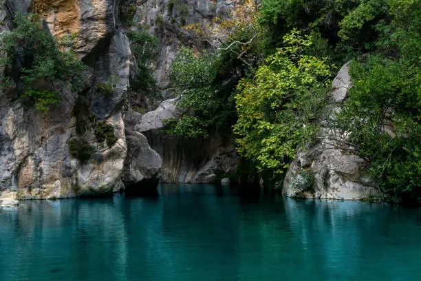 natural rocky canyon with clear blue water in Goynuk, Turkey