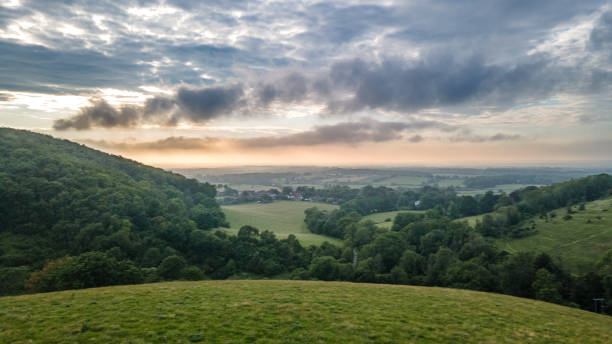 istock Panoramic nature hills landscape. Dramatic sky at sunset. 1367243365