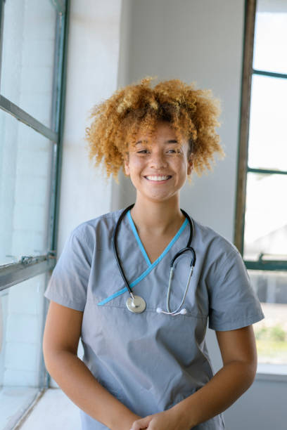 Friendly black female doctor stock photo