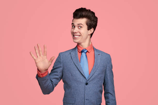 istock Smiling comic man showing number 5 with fingers 1367247148