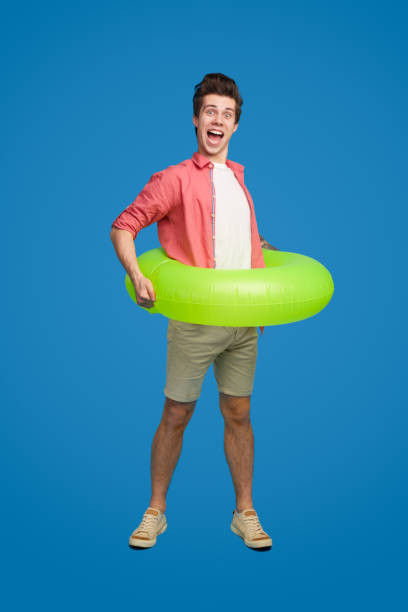 istock Funny man with inflatable tube 1367247178