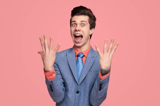 istock Excited businessman showing 9 fingers 1367247324