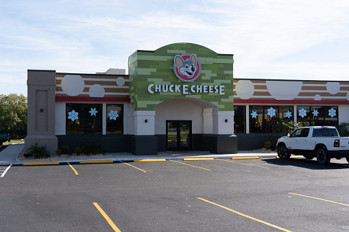 Orlando, Fl, USA - January 6, 2022: A Chuck E. Cheese restaurant in Orlando, Fl, USA. Chuck E. Cheese is an American family entertainment center and restaurant pizza chain.